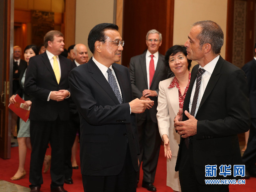 李克强会见华侨华人工商大会代表，共谋发展共创未来