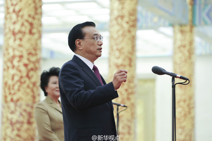 李克强会见第二届世界华侨华人工商大会全体代表，共谋发展，共创未来