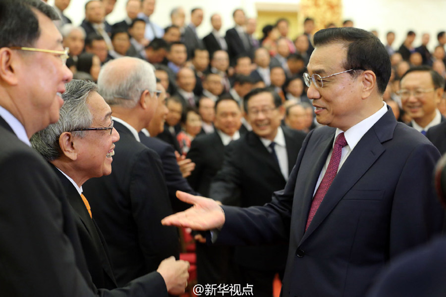 李克强会见第二届世界华侨华人工商大会全体代表，共谋发展，共创未来
